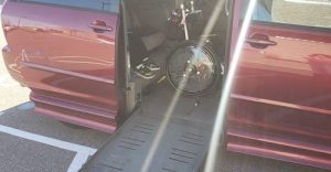 Van photo showing specialized ramp and wheelchair